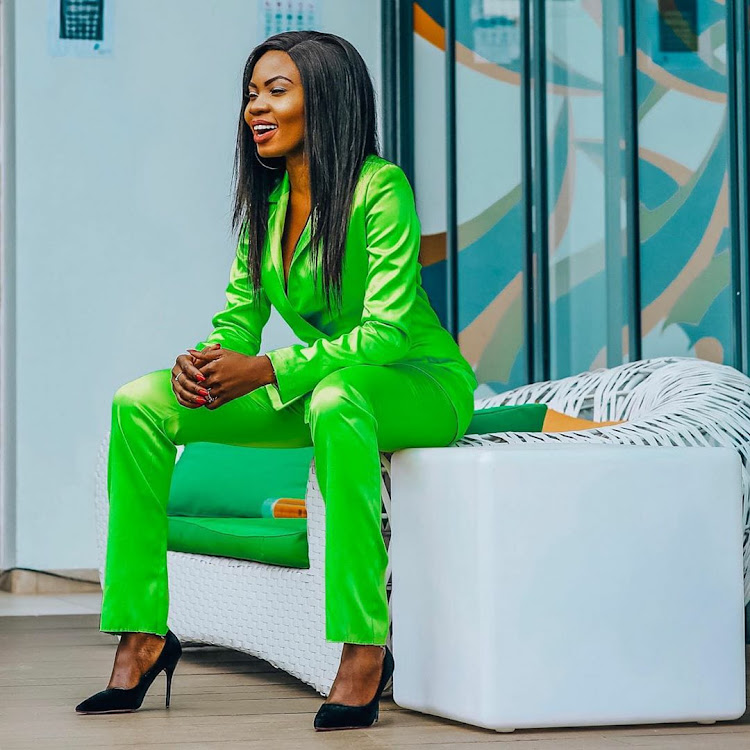 LuciaMusau, award winning fashion blogger pulls of an all neon look.