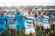 Argentina players celebrate after stunning the All Blacks of New Zealand in Sydney.