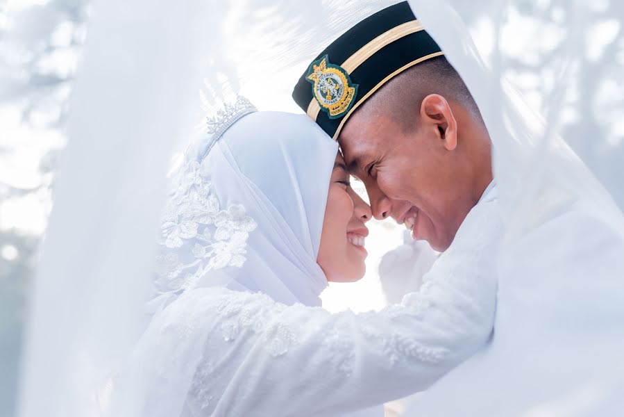 Fotógrafo de casamento Mohd Izzat Junos (izzatjunos). Foto de 20 de junho 2022