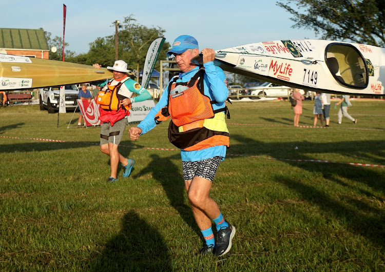 Graeme 'Gudgie' Dixon competing in his 50th consecutive Dusi canoe marathon.