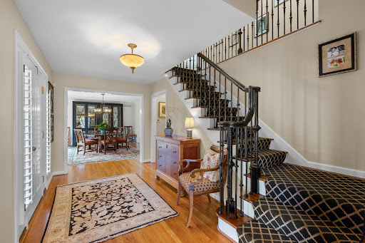 entryway hall with stairs and dining room - Prestige house for sale in St. Louis, 4 bedrooms