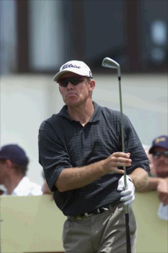 James Kingston, on the 1st tee at the SA Open in Durban, bites his lip as he watches where the ball lands on a particularly windy course. Pic: Jackie Clausen. © ST.