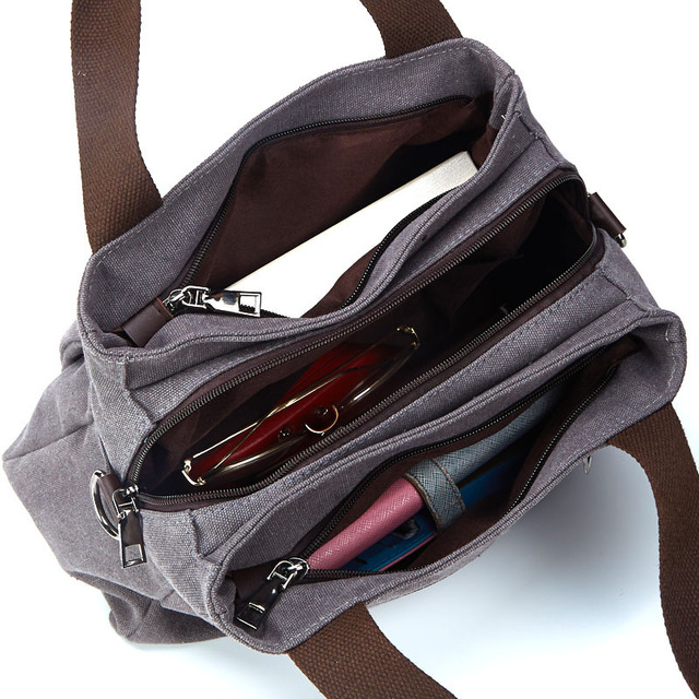 Sac en toile multi-compartiments, idéal pour organiser vos affaires. Parfait pour le travail, les voyages et le quotidien. Robuste et spacieux.