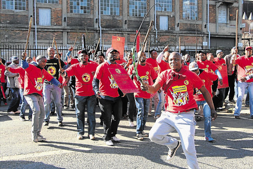 BAPTISED BY FIRE: President of the National Union of Mineworkers, Senzeni Zokwana, left, seen here with secretary-general Frans Baleni at a NUM Congress, has had a tough time lately - just like the union he used to lead Picture: