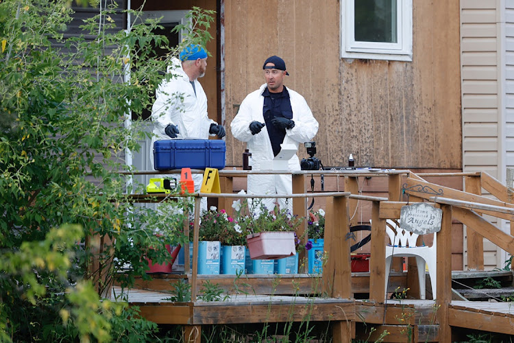 A police forensics team investigates a crime scene after multiple people were killed and injured in a stabbing spree in Weldon, Saskatchewan, Canada. on September 4 2022. Picture: REUTERS/DAVID STOBBE