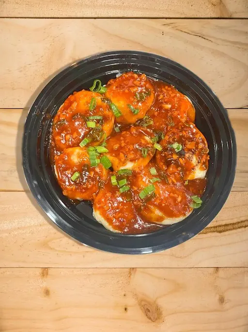 Veg Tossy Pan Fried Momos [8 Pieces] With Chilli Garlic Sauce