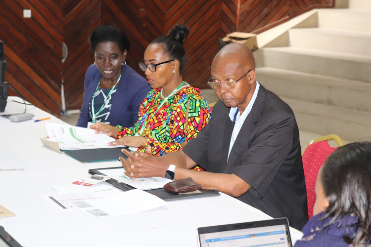 Hope Mruttu, running mate Janet Oben and John Mruttu at IEBC offices at the Taita Taveta University on Monday