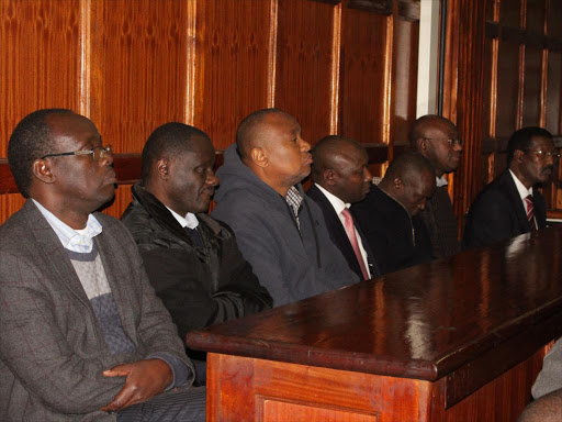 Suspects in KPLC corruption led by former MD Ben Chumo(right to left),K.P.Mungai,Joshua Mutua,former CEO Dr.Ken Tarus,Abubakar Swaleh,Samuel Ndirangu and Stanley Mutwiri at a Milimani court on Tuesday,July 17 during the hearing of the bail application.