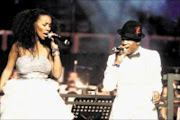 MAGICAL DUO: Mafikizolo's Nhlanhla Nciza and Theo Kgosinkwe perform during the massed choir festival at the Standard Bank Arena in Johannesburg, yesterday. PIC: ANTONIO MUCHAVE. 25/10/2009. © Sowetan.