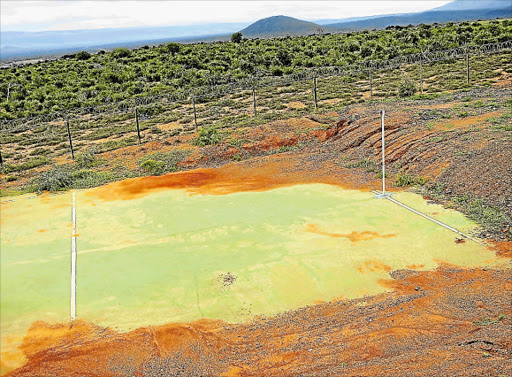 BAD GROUNDWORK: A netball court at the ‘upgraded’ Glenmoore Sports Facility is covered in soil due to no perimeter fence or retaining wall to prevent soil run-off Picture: MANDILAKHE KWABABANA