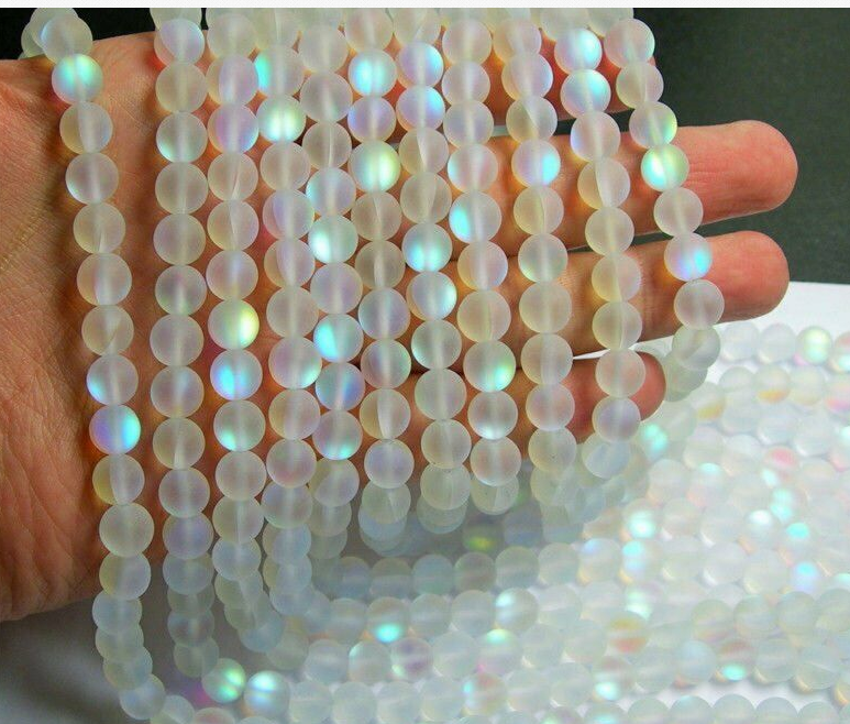 Cuentas sueltas de piedras preciosas de cuarzo Aura Mística Crea joyas únicas con el brillo iridiscente y la energía calmante para diseños exclusivos.