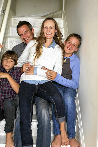 Bea Johnson with her husband, Scott, and sons Leo and Max.