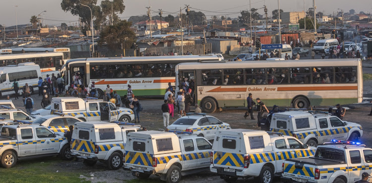 Commuters at Borcherds Quarry, Nyanga, in Cape Town. File photo.