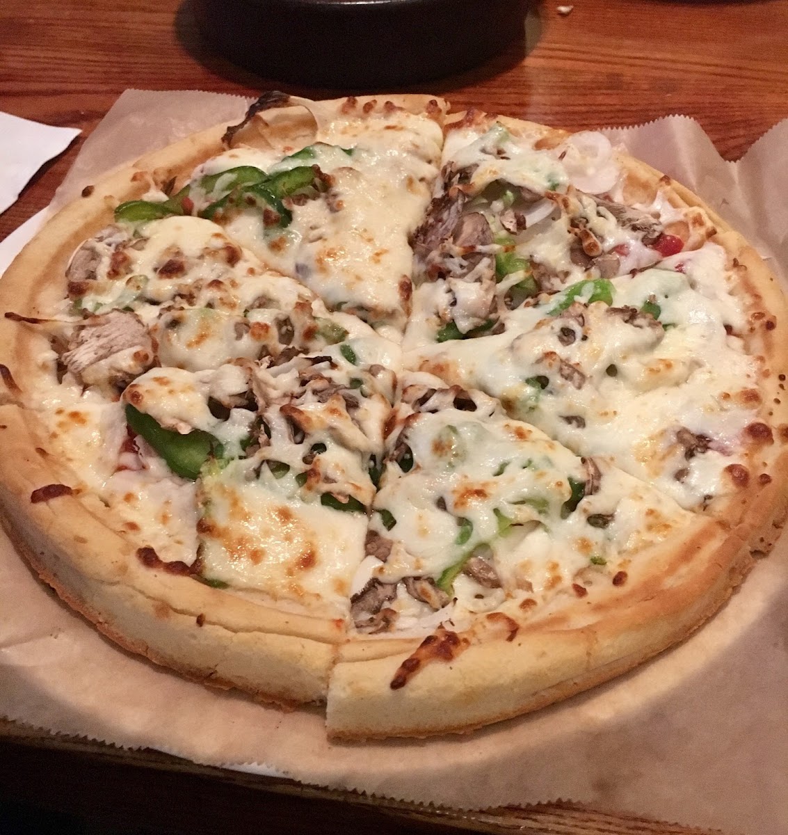 Gluten free veggie pizza (onions, peppers, mushrooms)