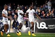 Aphelele Fassi of the Sharks celebrates after scoring a try for the Sharks against the Highlanders earlier this year when Super Rugby wasn't curtailed by the novel coronavirus.