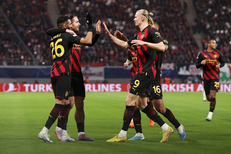 Manchester City winger Riyad Mahrez celebrates with teammates after scoring against RB Leipzig on Wednesday night