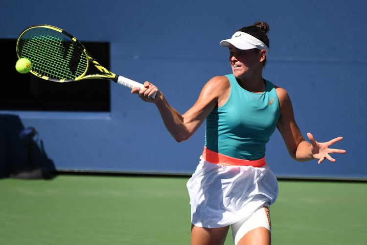 Jennifer Brady of the United States hits a forehand against Yulia Putintseva of Kazakhstan in their quarterfinal on day nine of the 2020 US Open tennis tournament at USTA Billie Jean King National Tennis Center in New York on September 8.