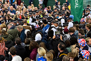  Protesters from climate protest group 'Just Stop Oil' are apprehended by police officers in the crowd close to where Britain's King Charles III and Britain's Camilla, Queen Consort will be crowned at Westminster Abbey on May 6, 2023 in London, England. The Coronation of Charles III and his wife, Camilla, as King and Queen of the United Kingdom of Great Britain and Northern Ireland, and the other Commonwealth realms takes place at Westminster Abbey today. Charles acceded to the throne on 8 September 2022, upon the death of his mother, Elizabeth II.