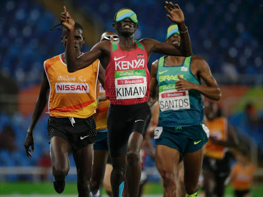 Samuel Mushai Kimani of Kenya leads the pack on his way to winning the gold medal in the event at the Rio Paralympics.