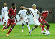 Junior Mendieta of Stellenbosch FC and Nyiko Mobbie of Sekhukhune United during the Nedbank Cup semi final match at Danie Craven Stadium on May 7 2023.
