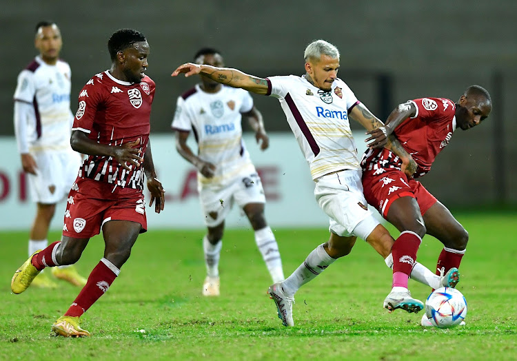 Junior Mendieta of Stellenbosch FC and Nyiko Mobbie of Sekhukhune United during the Nedbank Cup semi final match at Danie Craven Stadium on May 7 2023.