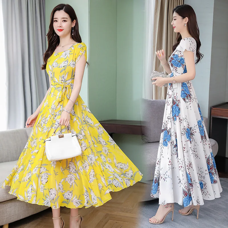 Robe de vacances imprimée amincissante à la taille, idéale pour une silhouette élégante et sublimée pendant les fêtes. Confort et style assurés.