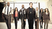 POLICE PRESENCE: Andre Braugher and Andy Samberg, third and fourth from left, are the axles around which 'Brooklyn Nine-Nine' spins.