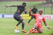 DURBAN, SOUTH AFRICA - FEBRUARY 18: Elias Pelembe of Royal AM and Zakhele Lepasa of SuperSport United during the DStv Premiership match between Royal AM and SuperSport United at Chatsworth Stadium on February 18, 2023 in Durban, South Africa. (Photo by Darren Stewart/Gallo Images)