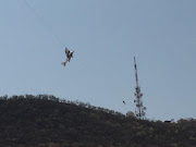 A man and woman were rescued this afternoon from their light aircraft after it became entangled in a zip-line approximately 300 metres above the ground at a resort outside of Rustenburg.