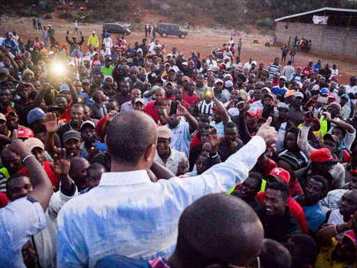 Nairobi governor aspirant Peter Kenneth addresses supporters in Dagoretti where he went to watch a football match, February 26, 2017. /COURTESY