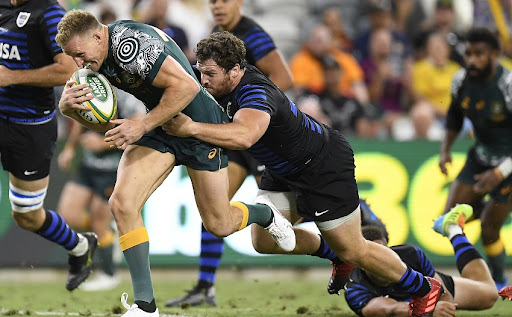 Reece Hodge of the Wallabies runs in to score a try during The Rugby Championship match between the Australian Wallabies and Argentina Pumas at QCB Stadium on September 25, 2021 in Townsville, Australia.