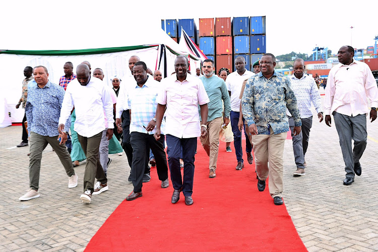 President William Ruto accompanied by other leaders on a tour of Mombasa Port in Kilindini, July 29, 2023.