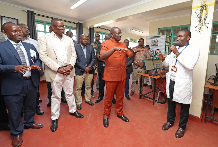 President William Ruto and ICT CS Eliud Owalo with leaders at URIRI Technical and Vocational College Konza Digital Skill Laboratory on October 8, 2023.