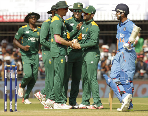 JP Duminy celebrates after taking a catch during the second one-day international against India at Ushabai Holkar Stadium, Indore, India. The Proteas failed to reach a paltry 247 posted by the hosts.