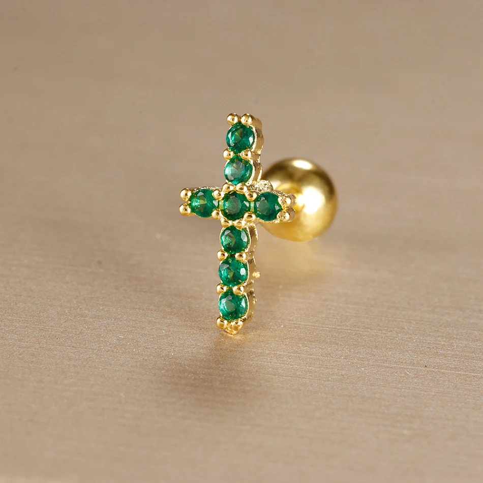 Clou d'oreille en acier inoxydable avec couronne de zircon vert pour l'os de l'oreille, hypoallergénique et durable.