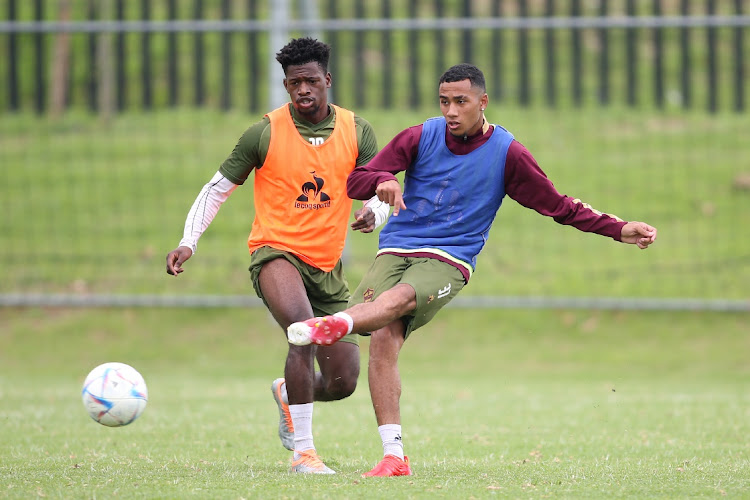 Qobolwakhe Sibande of Stellenbosch FC challenges as Kyle Jurgens of Stellenbosch FC gets his pass away during the 2023 Nedbank Cup Stellenbosch FC Media Day held at the Lentelus Sports Ground in Stellenbosch on 12 April 2023.