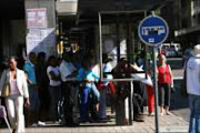 NO SERVICE: Bus passengers swamped taxi ranks around Johannesburg yesterday in an effort to get to their destinations. Pic. Lucky Nxumalo. © Sowetan.