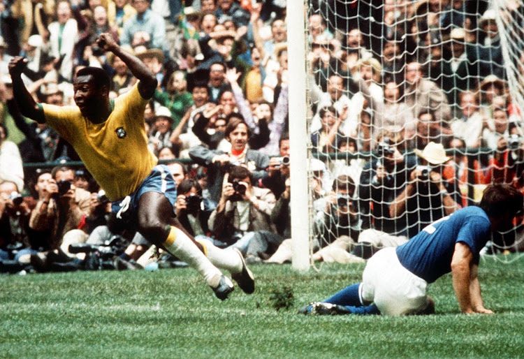 Pelé turns in celebration after scoring Brazil's first goal. in their 1970 World Cup final win against Italy, at Estadio Azteca in Mexico City.