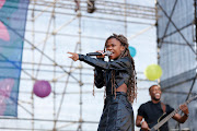 Nomfundo Moh performing at the Malibongwe-Tribute To Women concert in Emmarentia Botanical Gardens in Johannesburg, celebration Women's Day. 