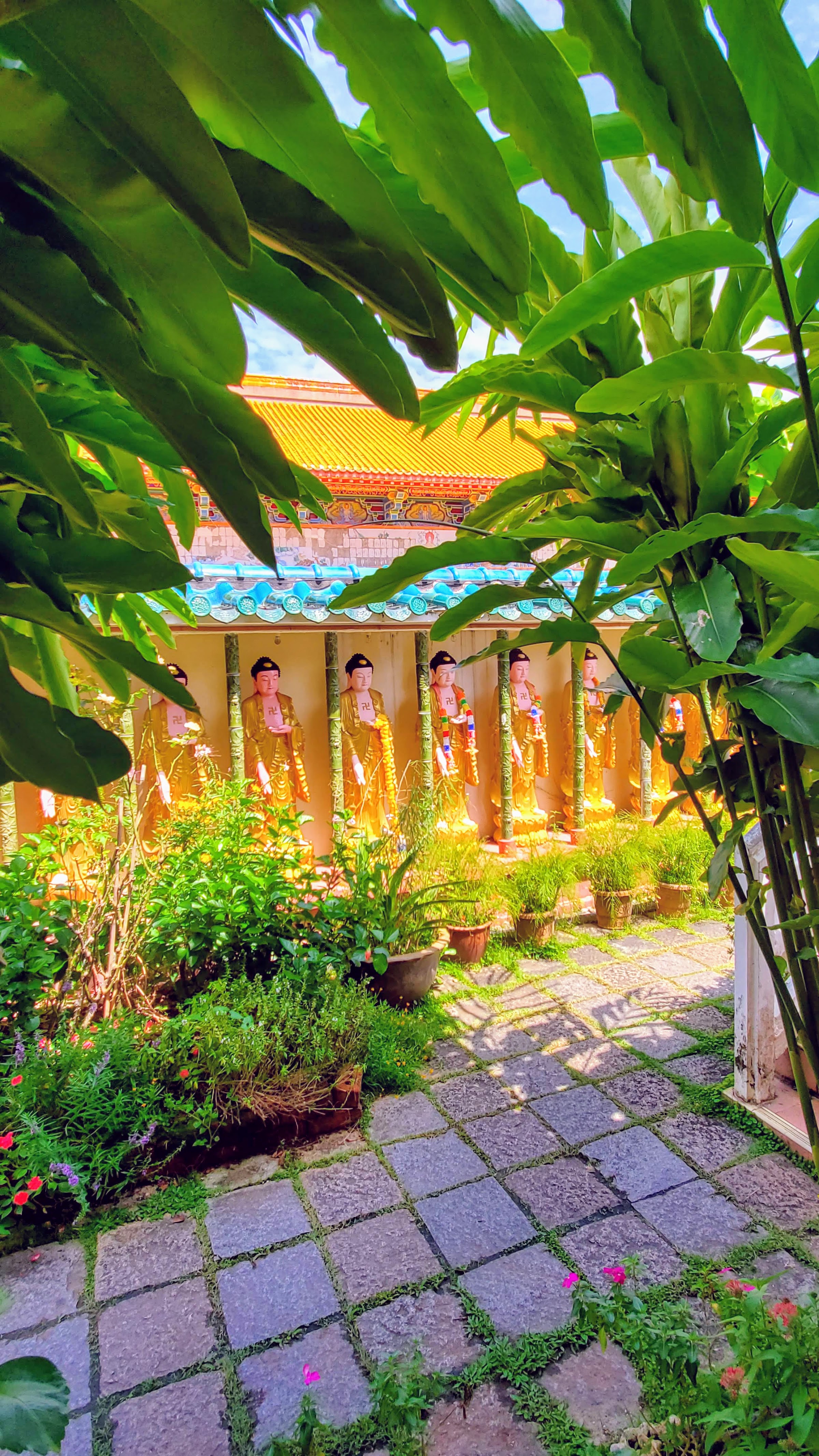 Visiting Kek Lok Si: What makes it unique is that among its millions of Buddhas it shows the blending of cultures that is so representative of Malaysia by including many stylistic representations of Buddha.