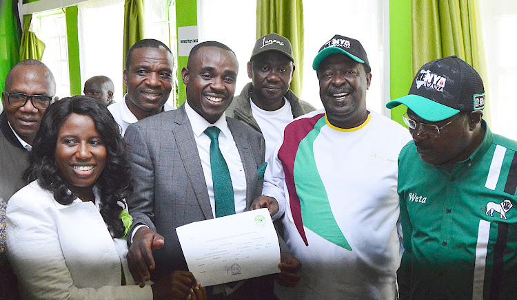 Kakamega Senator Cleophas Malala, ANC leader Musalia Mudavadi and Ford Kenya leader Moses Wetang'ula and other officials at the IEBC offices in Kakamega on Tuesday, June 7, 2022.