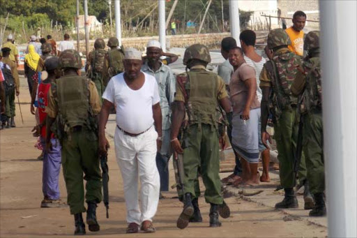 Can’t be too safe: Administration Police officers patrol a street in Lamu town on October 28, 2014.