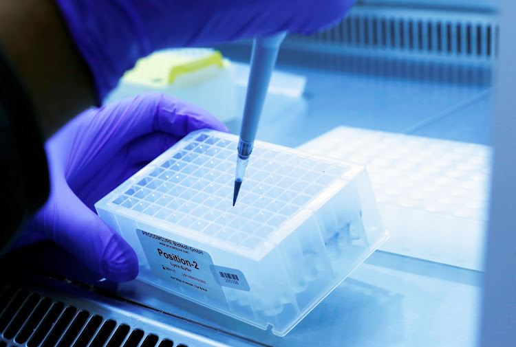 A laboratory worker works on fast PCR testing samples in a mobile laboratory truck, amid the Covid-19 outbreak, in Soelden, Austria, on October 15.