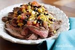 Grilled Flank Steak with Black Beans Corn and Tomatoes was pinched from <a href="http://www.skinnytaste.com/2012/05/grilled-flank-steak-with-black-beans.html" target="_blank">www.skinnytaste.com.</a>