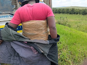 The Swazi man was a taxi passenger en route to KwaZulu-Natal with a hefty amount of dagga strapped to his body.