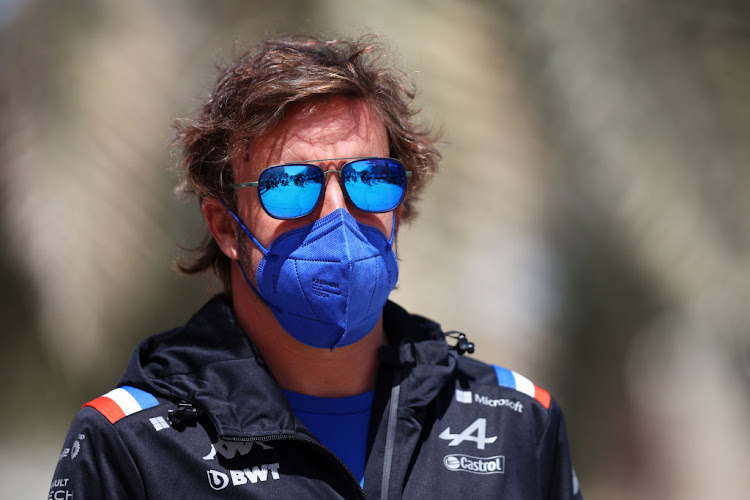 Fernando Alonso in the paddock before practice for the F1 Grand Prix of Bahrain March 18.