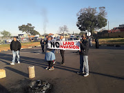 Residents from Lenasia South during a previous protest against an alleged land invasion in the area. 