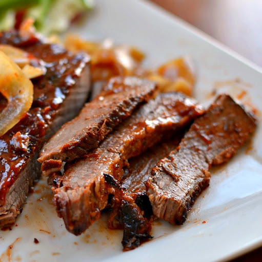 A super easy family friendly Oven Baked Barbecued Beef Brisket made with ingredients commonly found in your pantry. Is your weather way too cold to grill outside.