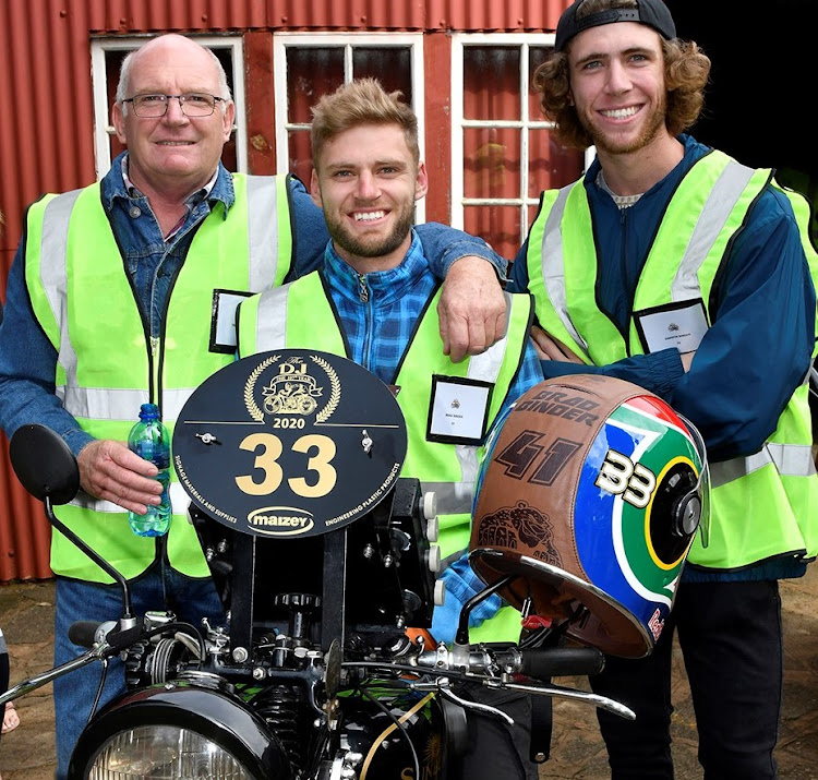 Trevor Binder with famous racing sons Brad and Darryn. Picture: SUPPLIED