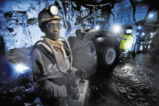 A miner at SA's Gold Fields's South Deep mine controls heavy machinery remotely. Gold Fields Ltd has announced on Tuesday 29 March 2016 that it has finalised a tax and royalties agreement with the government of Ghana which could safeguard its Damang mine, where around 2,000 jobs would be at risk if it is placed under care and maintenance.